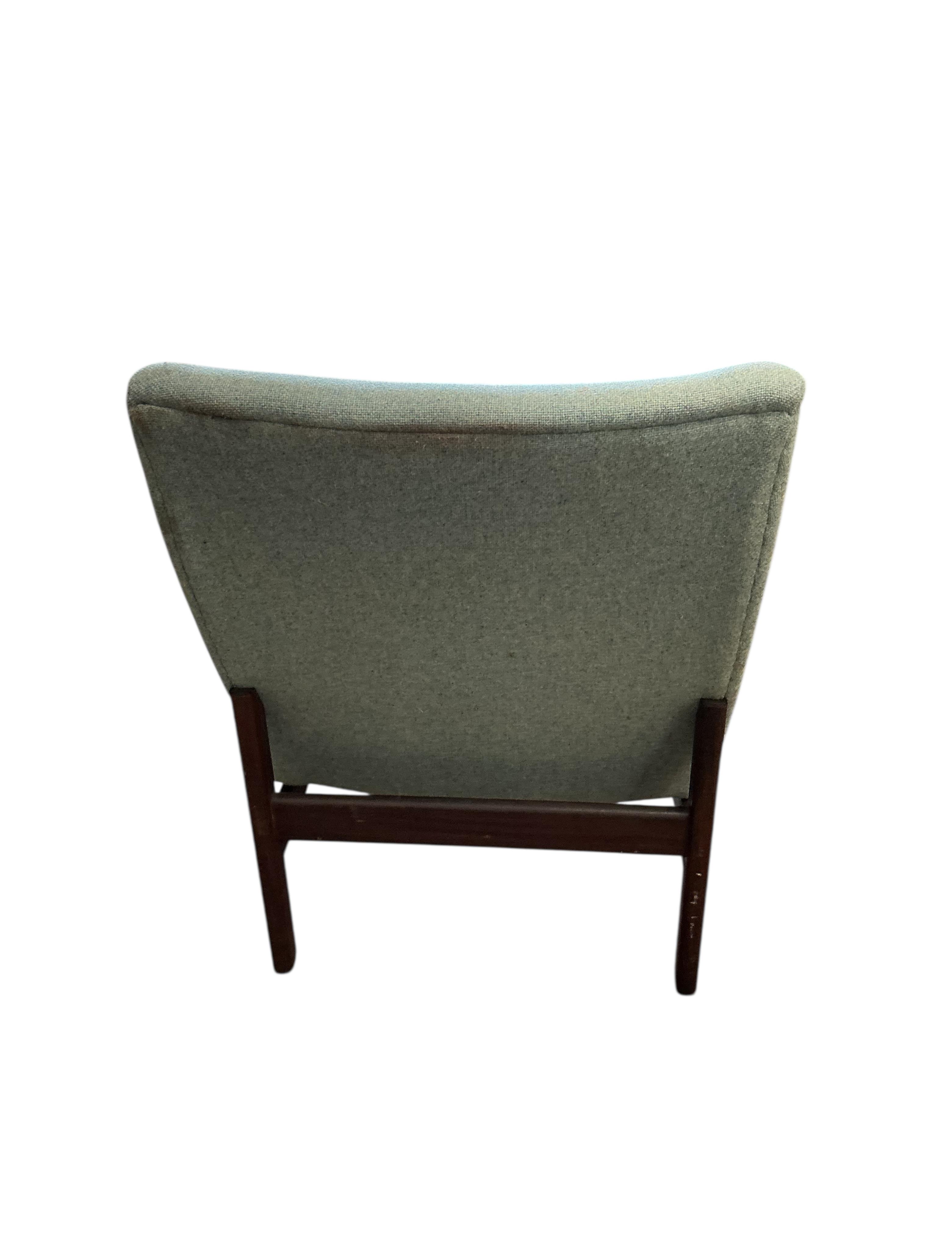 An Afromosia cocktail chair in a Danish style, width 55cm, depth 60cm, height 78cm